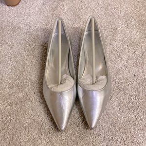 Metallic silver flats.